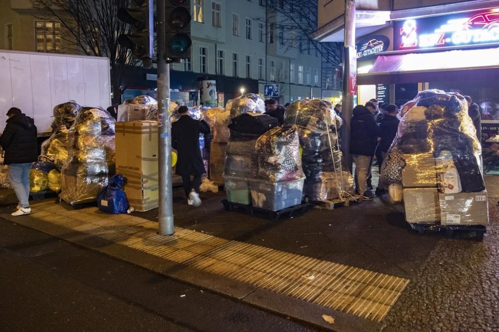 Relief supplies for earthquake victims in Turkey and Syria stand packed on Turmstrasse in Moabit, in Berlin, Germany, Monday, Feb. 6, 2023. Members of the Turkish community in Berlin collected tons of relief supplies within a few hours. Rescuers in Turkey and war-ravaged Syria searched through the frigid night into Tuesday, hoping to pull more survivors from the rubble after an earthquake killed and injured thousands of people and toppled thousands of buildings across a wide region. (Paul Zinken/dpa via AP)