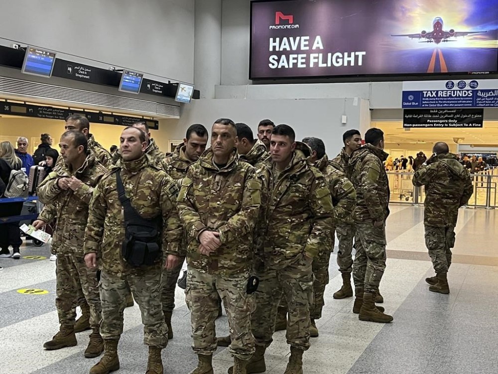 Soldiers from Lebanon's Engineering Regiment arrive at Rafik Hariri International Airport in Beirut, Lebanon, as they head to Turkey to assist in the rescue efforts, Monday, Feb. 6, 2023. A powerful earthquake hit southeast Turkey and Syria overnight, toppling hundreds of buildings and killing and injuring thousands of people. (AP Photo/Hussein Malla)