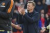 Leeds United's head coach Jesse Marsch applauds after losing 0-1 against Nottingham Forest in an English Premier League soccer match at City Ground stadium in Nottingham, England, Feb. 5, 2023. American coach Jesse Marsch was fired by Leeds on Monday Feb. 6, 2023, after nearly a year in charge of the relegation-threatened Premier League team. (AP Photo/Rui Vieira, File)