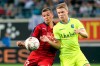 Bordeaux's Nicolas De Preville, left, and Gent's Sigurd Rosted battle for the ball during the Europa League playoff, first leg, soccer match between Gent and Bordeaux at the KAA Gent Stadium in Ghent, Belgium, Thursday, Aug. 23, 2018. THE CANADIAN PRESS/AP/Francois Walschaerts