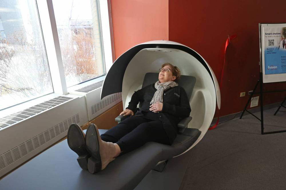 Marlene Heise, Director, Wealth, Insurance and Real Estate Services for Fusion Credit Union, chills out in the new EnergyPod. (Tim Smith / The Brandon Sun)