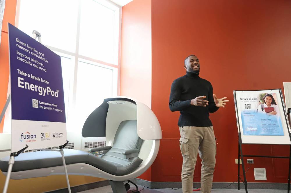Anugo Okudo, Vice President Engagement for the Brandon University Students’ Union, unveils the EnergyPod on Thursday. (Tim Smith / The Brandon Sun)
