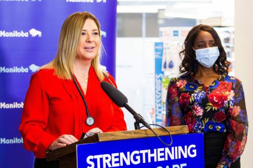 MIKAELA MACKENZIE / WINNIPEG FREE PRESS
                                Dr. Candace Bradshaw, president of Doctors Manitoba, with Health Minister Audrey Gordon.