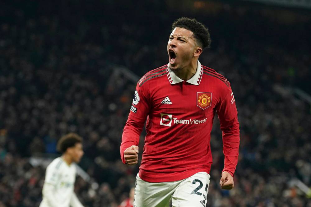 Dave Thompson / The Associated Press
Manchester United’s Jadon Sancho celebrates after scoring Wednesday against Leeds during his first game back following a break to take care of his mental health.