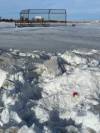 Around 3 p.m. Friday, there was a patch of blood in the snow steps from the Westbound Ness at Mount Royal bus stop. (Gabrielle Piché / Winnipeg Free Press)