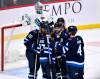 FRED GREENSLADE / THE CANADIAN PRESS
                                Winnipeg Jets’ Pierre-Luc Dubois (80) celebrates his goal against the Seattle Kraken with Nikolaj Ehlers (27), Josh Morrissey (44) and Neal Poink (4) during third period NHL action in Winnipeg.