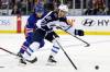 Winnipeg Jets left wing Kyle Connor controls the puck against New York Rangers defenceman Jacob Trouba in the second period Monday in New York. (AP Photo/Adam Hunger)