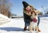 RUTH BONNEVILLE / WINNIPEG FREE PRESS
                                Silvija Boshkovsta keeps her dog Nira close to her on a leash as she walks her dog Nira along the Assiniboine River on Tuesday. See story on dog owners walking dogs without being on a leash along the river walks throughout the city. Feb 21st, 2023
