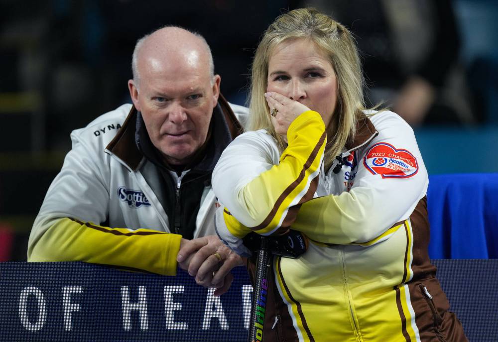 Darryl Dyck / THE CANADIAN PRESS
                                When Jennifer Jones (right) asked Glenn Howard (left) to coach her team, there was no way he could turn her down.