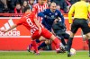 Berlin's Rani Khedira, left, fights for the ball against Mainz's Ludovic Ajorque during the German Bundesliga soccer match between Union Berlin and FSV Mainz 05 in Berlin, Germany, Saturday, Feb.4, 2023. (Andreas Gora/dpa via AP)