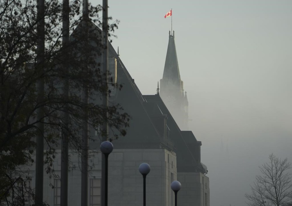 Parliament Hill and the Supreme Court of Canada are shrouded in fog in Ottawa, on Friday, Nov 4, 2022. The federal government is being urged to follow through with its commitment to develop a Black Canadian justice strategy.THE CANADIAN PRESS/Sean Kilpatrick
