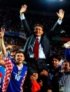 FILE - Croatian soccer team coach Miroslav Blazevic is held shoulder high by his team players, Zvonimir Boban, left, and Vladimir Vasilj after his team won 2-1 the soccer World Cup 98 third-place playoff match between the Netherlands and Croatia at the Parc des Princes in Paris, on July 11, 1998. Miroslav “Ciro” Blazevic, who coached the Croatian national soccer team to the semifinals of the 1998 World Cup in France, has died. He was 87. His family and friends said Blazevic died at a Zagreb hospital on Wednesday Feb. 8, 2023, after a long battle with prostate cancer. (AP Photo/Ricardo Mazalan, File)