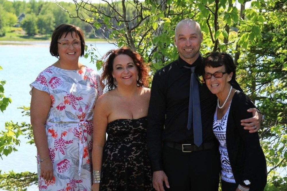 Kimberley DeWolfe (left to right), Jennifer DeWolfe, Mark DeWolfe and their mother, Diane Breen, are shown in a family handout photo. For the daughters of Diane Breen, the enduring tragedy of their mother's death following an eight-hour wait at a Nova Scotia ER is not knowing what lessons were learned. THE CANADIAN PRESS/HO-Jennifer DeWolfe **MANDATORY CREDIT**