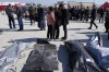 People mourn over the bodies of earthquake victims outside a hospital in Antakya, southeastern Turkey, Thursday, Feb. 9, 2023. Immigration Minister Sean Fraser says Canada may fast track applications to come to Canada for people in the earthquake zones of Turkey and Syria. THE CANADIAN PRESS/AP-Khalil Hamra