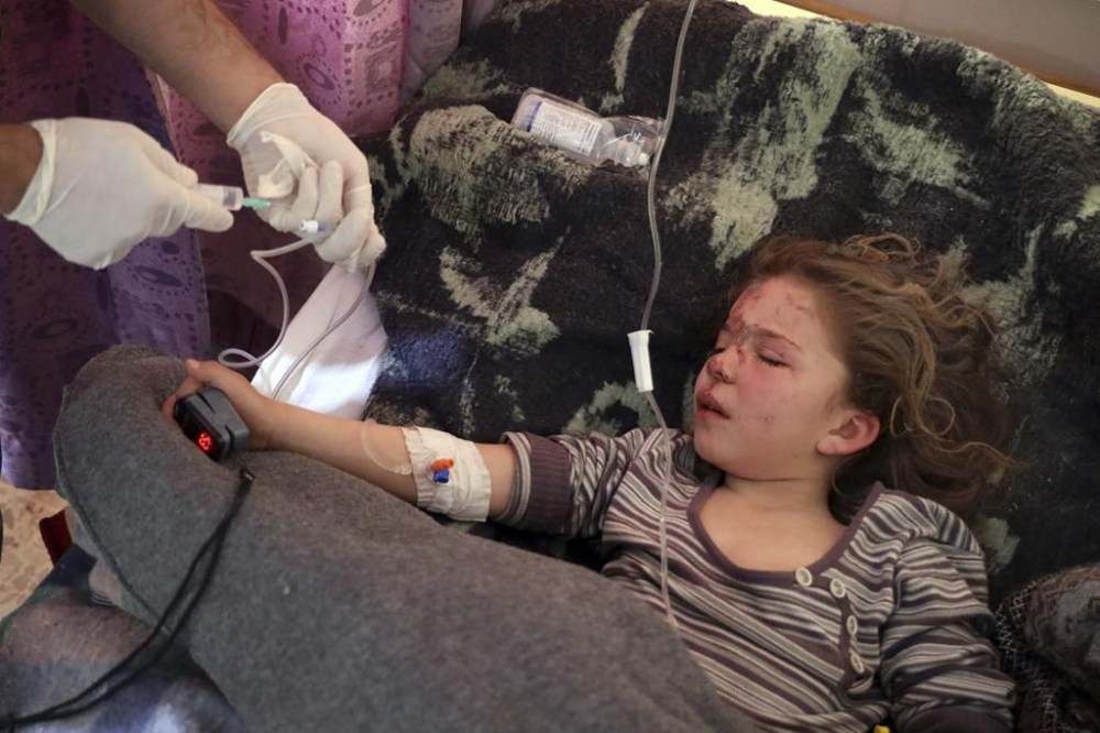 Jana al-Abdo, 7 years-old, who was pulled from under the rubble after a 50-hour rescue operation caused by an earthquake that hit Syria and Turkey, receives treatment at a hospital run by the Syrian American Medical Society near the Bab al-Hawa border crossing with Turkey in the north of Idlib province, Syria, Wednesday, Feb. 8, 2023. . Jana is one of untold numbers of orphans left by Monday's 7.8 magnitude quake. (AP Photo/Omar Albam)