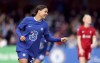 Chelsea's Sam Kerr celebrates scoring during the Women's FA Cup fourth round soccer match between Chelsea and Liverpool at Kingsmeadow, London, Sunday Jan. 29, 2023. (Steven Paston/PA via AP)