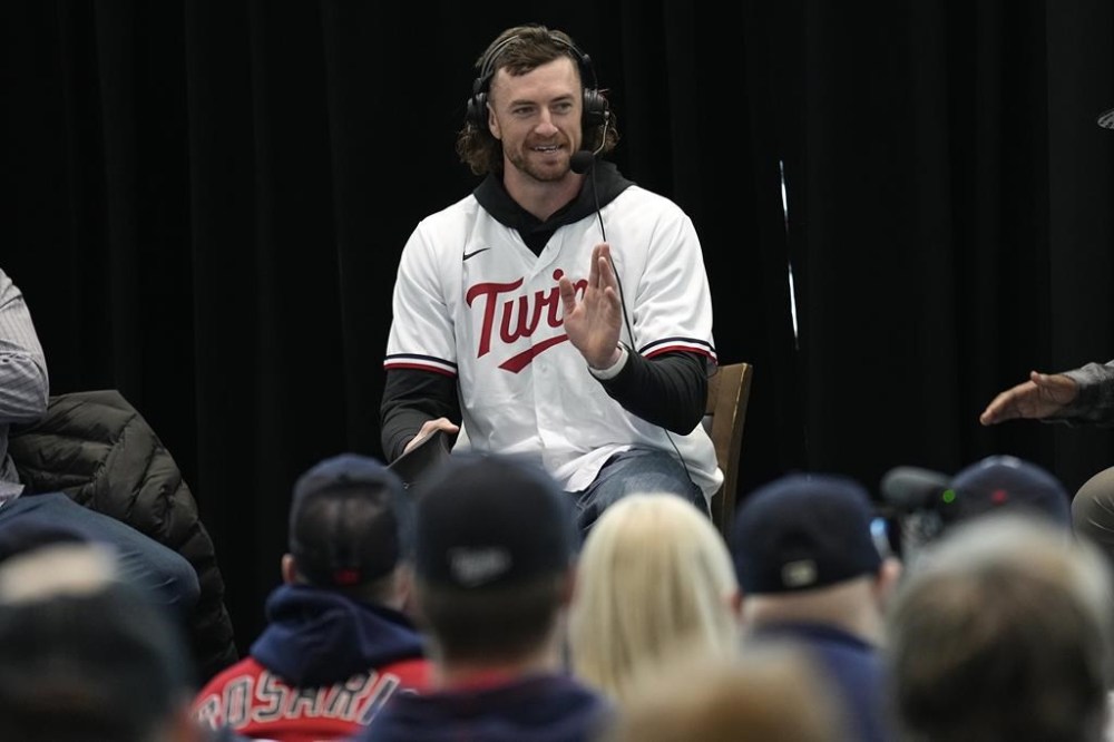 Minnesota Twins starting pitcher Chris Paddack speaks to fans and media during the team's annual fan fest at Target Field, Saturday, Jan. 28, 2023, in Minneapolis. (AP Photo/Abbie Parr)