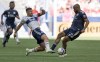 Former Vancouver Whitecap striker Lucas Cavallini is back in Mexico, this time with Tijuana. The 30-year-old Canadian international played for Puebla in Liga MX before joining Vancouver as a designated player. Cavallini, left, tries to push the ball past New England Revolution's Andrew Farrell during first half MLS soccer action in Vancouver, on June 26, 2022. THE CANADIAN PRESS/Rich Lam