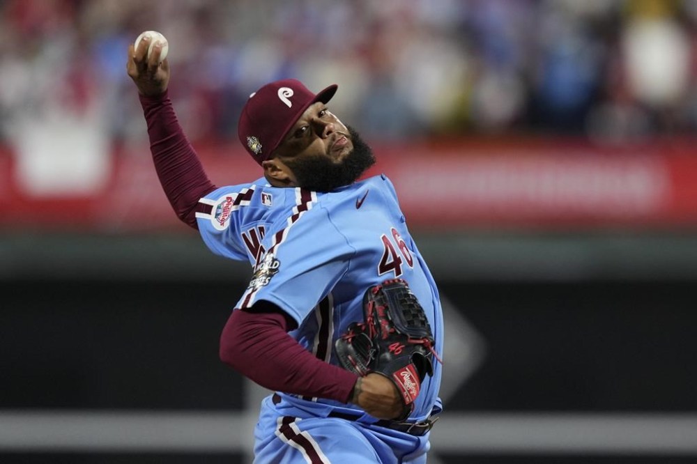 FILE - Philadelphia Phillies relief pitcher Jose Alvarado throws during the sixth inning in Game 5 of baseball's World Series between the Houston Astros and the Philadelphia Phillies on Thursday, Nov. 3, 2022, in Philadelphia. The Phillies reliever avoided arbitration, agreeing to a one-year deal for $3.45 million. He had filed for $3.7 million and the Phillies' $3.2 million. (AP Photo/Matt Slocum, File)