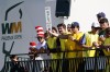 Colorful golf fans try to quiet the crowd as players putt on the 16th hole during the second round of the Phoenix Open golf tournament Friday Feb. 10, 2023, in Scottsdale, Ariz. (AP Photo/Darryl Webb)
