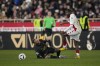 PSG's Neymar falls to the pitch after being fouled by Monaco's Mohamed Camara during a French League One soccer match between Monaco and Paris Saint-Germain at the Stade Louis II in Monaco, Saturday, Feb. 11, 2023. (AP Photo/Daniel Cole)