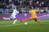 Real Madrid's Vinicius Junior scores the opening goal past Al Hilal goalkeeper Abdullah Al-Mayouf during the FIFA Club World Cup final match between Real Madrid and Al Hilal at Prince Moulay Abdellah stadium in Rabat, Morocco, Saturday, Feb. 11, 2023. (AP Photo/Manu Fernandez)
