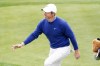 Rory McIlroy acknowledges the crowd as he walks to the 10th hole during the third round of the Phoenix Open golf tournament, Saturday, Feb. 11, 2023, in Scottsdale, Ariz. (AP Photo/Darryl Webb)