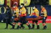Medics carry Villarreal's Francis Coquelin from the pitch during a Spanish La Liga soccer match between Villarreal and Barcelona, at the Ceramica stadium in Villarreal, Spain, Sunday, Feb. 12, 2023. (AP Photo/Alberto Saiz)