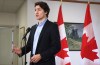 Prime Minister Justin Trudeau speaks to the media Sunday, February 12, 2023, in Ottawa before boarding a flight to the Yukon after ordering the take down of an unidentified object that violated Canadian airspace. THE CANADIAN PRESS/Patrick Doyle
