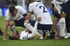 Tottenham's Rodrigo Bentancur gets treatment after an injury during the English Premier League soccer match between Leicester City and Tottenham Hotspur at King Power stadium in Leicester, England, Saturday, Feb. 11, 2023. (AP Photo/Rui Vieira)