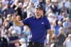Nick Taylor acknowledges the crowd on the 18th hole during the final round of the Phoenix Open golf tournament, Sunday, Feb. 12, 2023, in Scottsdale, Ariz. THE CANADIAN PRESS/AP/Darryl Webb
