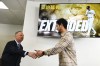 San Diego Padres pitcher Yu Darvish, right, shakes hands with sportscaster Don Orsillo at a baseball news conference on Friday, Feb. 10, 2023, in San Diego. Darvish signed a new contract with the Padres that guarantees the pitcher an additional $90 million and will keep him with the club through the 2028 season. (AP Photo/Denis Poroy)