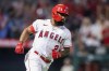 FILE - Los Angeles Angels' Luis Rengifo runs past first after hitting a solo home run against the Texas Rangers during the third inning of a baseball game in Anaheim, Calif., Sept. 30, 2022. Rengifo went to salary arbitration with the Los Angeles Angels on Monday, Feb. 13, 2023, requesting a raise from $730,000 to $2.3 million while the team argued for $2 million. (AP Photo/Alex Gallardo, File)