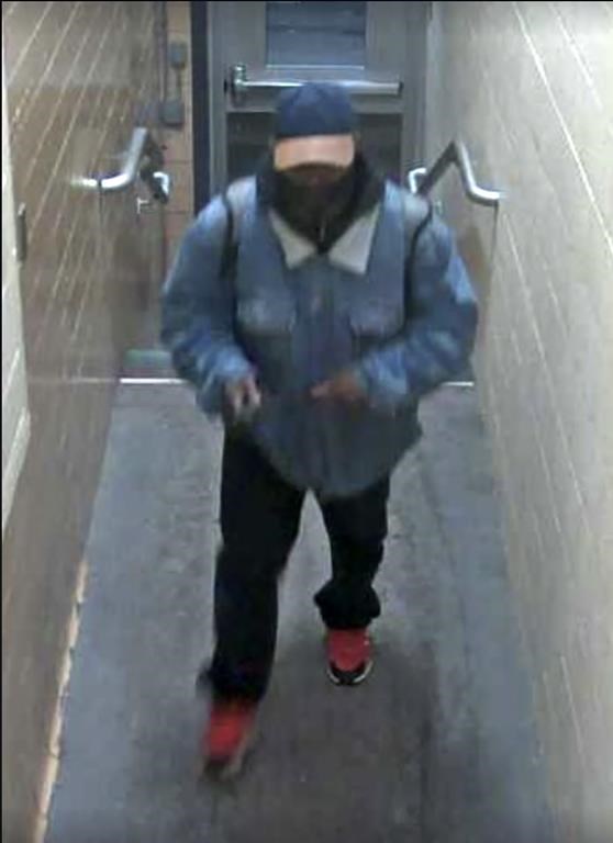 This image from surveillance video provided by Michigan State University Police and Public Safety shows a suspect whom authorities are looking for in connection with multiple shootings at the university late Monday, Feb. 13, 2023, in East Lansing, Mich. (Courtesy of MSU Police and Public Safety via AP)