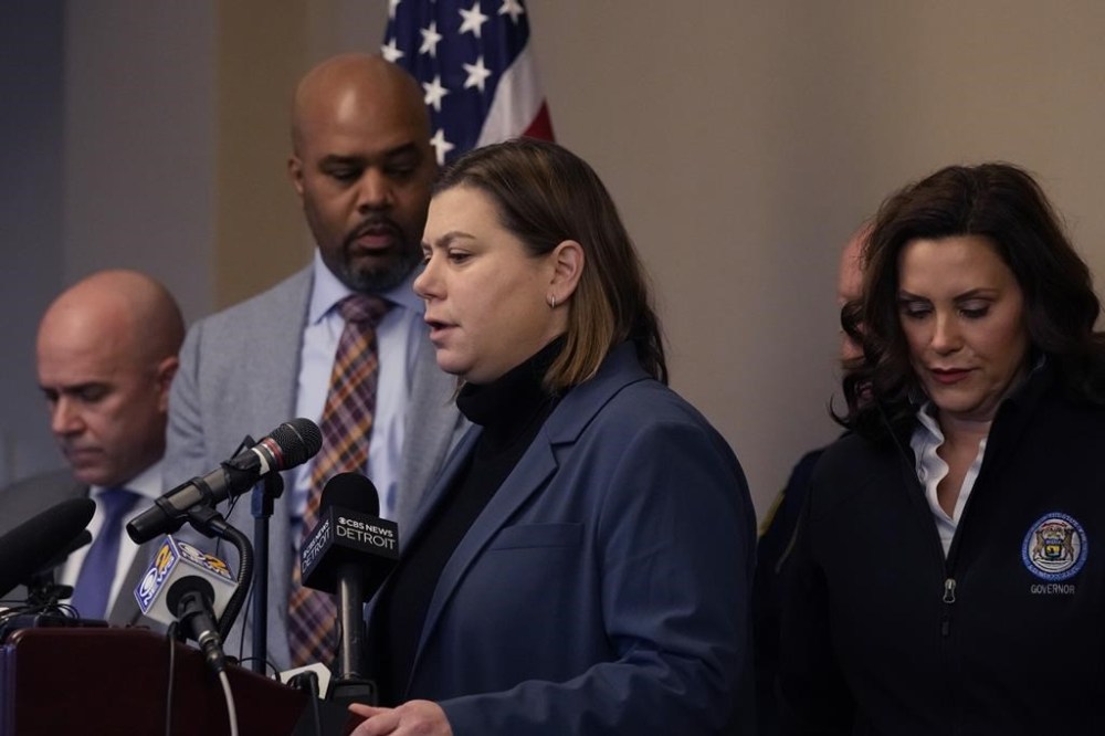 Rep. Elissa Slotkin, D-Mich., addresses the media, Tuesday, Feb. 14, 2023, in East Lansing, Mich. A gunman killed several people and wounded others at Michigan State University. The shooting set off an hours-long manhunt as frightened students hid in classrooms and cars. Police said early Tuesday that the shooter eventually killed himself. (AP Photo/Carlos Osorio)