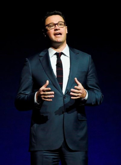 FILE - Dave Hollis, executive vice president of theatrical distribution for Walt Disney Studios Motion Pictures, addresses the audience during the studio's presentation at CinemaCon 2016, the official convention of the National Association of Theatre Owners, at Caesars Palace on April 13, 2016, in Las Vegas. Hollis, who left his spot as a Disney executive to join this then-wife Rachel Hollis in running her lifestyles empire, which include her bestselling book “Girl, Wash Your Face,” has died at his home in Texas on Sunday, Feb. 12, 2023. He was 47. (Photo by Chris Pizzello/Invision/AP, File)