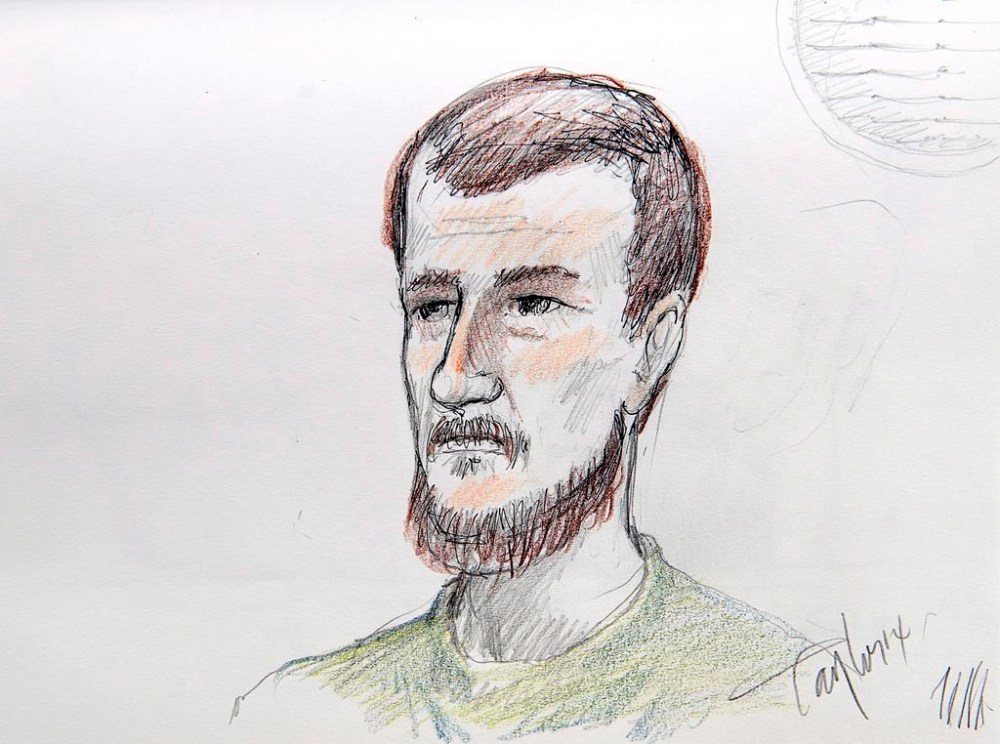 Justin Bourque is depicted in an artist's sketch at his sentencing hearing in Moncton, N.B., on Tuesday, Oct. 28, 2014. THE CANADIAN PRESS/Carol Taylor