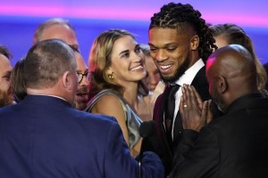 Buffalo Bills' Damar Hamlin speaks in front of University of Cincinnati Medical Center staff during the NFL Honors award show ahead of the Super Bowl 57 football game,Thursday, Feb. 9, 2023, in Phoenix. (AP Photo/David J. Phillip)