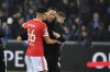 Benfica's head coach Roger Schmidt, right, hugs his player Antonio Silva at end of the Champions League round of 16 first leg soccer match between Club Brugge and Benfica at the Jan Breydel stadium in Bruges, Belgium, Wednesday, Feb. 15, 2023. Benfica won 2-0. (AP Photo/Geert Vanden Wijngaert)