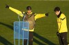 Dortmund's Jude Bellingham, left, reacts to Dortmund's Giovanni Reyna, right, during the final training session ahead of the Champions League, round of 16, first leg soccer match between Borussia Dortmund and Chelsea FC in Dortmund, Germany, Tuesday, Feb. 14, 2023. (AP Photo/Martin Meissner)