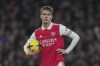 Arsenal's Martin Odegaard reacts during the English Premier League soccer match between Arsenal and Manchester City at the Emirates stadium in London, England, Wednesday, Feb.15, 2023. (AP Photo/Kin Cheung)