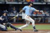 FILE - Tampa Bay Rays' David Peralta bats against the Houston Astros during the fourth inning of a baseball game on Sept. 19, 2022, in St. Petersburg, Fla. Peralta finalized a $6.5 million, one-year contract on Thursday, Feb. 16, 2023, with the Los Angeles Dodgers, who reached one-year deals with pitchers Jimmy Nelson for $1.2 million and Alex Reyes for $1.1 million. (AP Photo/Chris O'Meara, File)