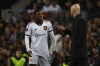 Manchester United's head coach Erik ten Hag, right, gives instructions from the side line to his player Tyrell Malacia during the Europa League playoff first leg soccer match between Barcelona and Manchester United at the Camp Nou stadium in Barcelona, Spain, Thursday, Feb. 16, 2023. (AP Photo/Joan Monfort)