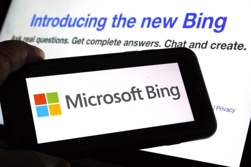 File - The Microsoft Bing logo and the website's page are shown in this photo taken in New York on Tuesday, Feb. 7, 2023. Microsoft is promising to make improvements to its new artificially intelligent Bing search engine after it's been insulting and threatening some of its early users. (AP Photo/Richard Drew, File)