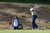 Matt Kuchar hits his approach shot to the seventh hole during the first round of the Genesis Invitational golf tournament at Riviera Country Club, Thursday, Feb. 16, 2023, in the Pacific Palisades area of Los Angeles. (AP Photo/Ryan Kang)