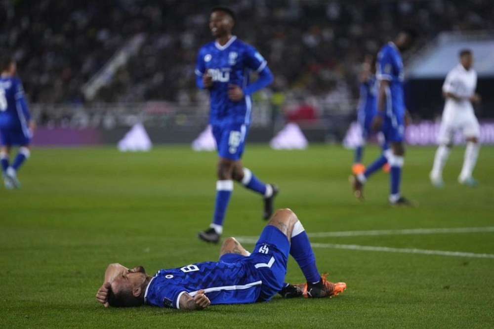 Al Hilal's Gustavo Cuellar reacts after missing a scoring chance during the FIFA Club World Cup final match between Real Madrid and Al Hilal at Prince Moulay Abdellah stadium in Rabat, Morocco, Saturday, Feb. 11, 2023. (AP Photo/Manu Fernandez)