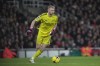Arsenal's goalkeeper Aaron Ramsdale reacts during the English Premier League soccer match between Arsenal and Manchester City at the Emirates stadium in London, England, Wednesday, Feb.15, 2023. (AP Photo/Kin Cheung)