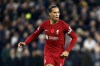 FILE - Liverpool's Virgil van Dijk controls the ball during the English Premier League soccer match between Tottenham Hotspur and Liverpool at Tottenham Hotspur Stadium, in London, Sunday, Nov. 6, 2022. Liverpool center back Virgil van Dijk is on track to start at Newcastle on Saturday, Feb. 18, 2023, after sitting out for nearly six weeks with a hamstring injury. (AP Photo/David Cliff, File)