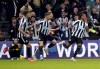 Newcastle United's Joe Willock, right, celebrates scoring a goal before it is later ruled out, during the English Premier League soccer match between Newcastle United and West Ham United, at St. James' Park, in Newcastle upon Tyne, England, Saturday, Feb. 4, 2023. (Owen Humphreys/PA via AP)