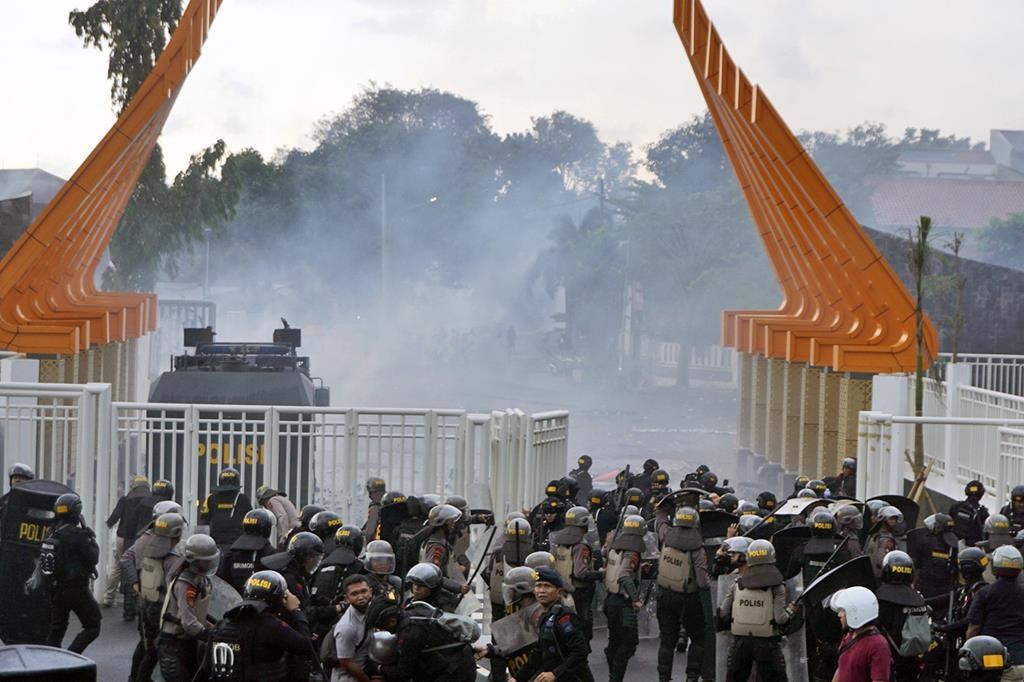 Police Deploy Tear Gas After Teachers Break Through Barriers at World Cup Fan Fest Site in Mexico City